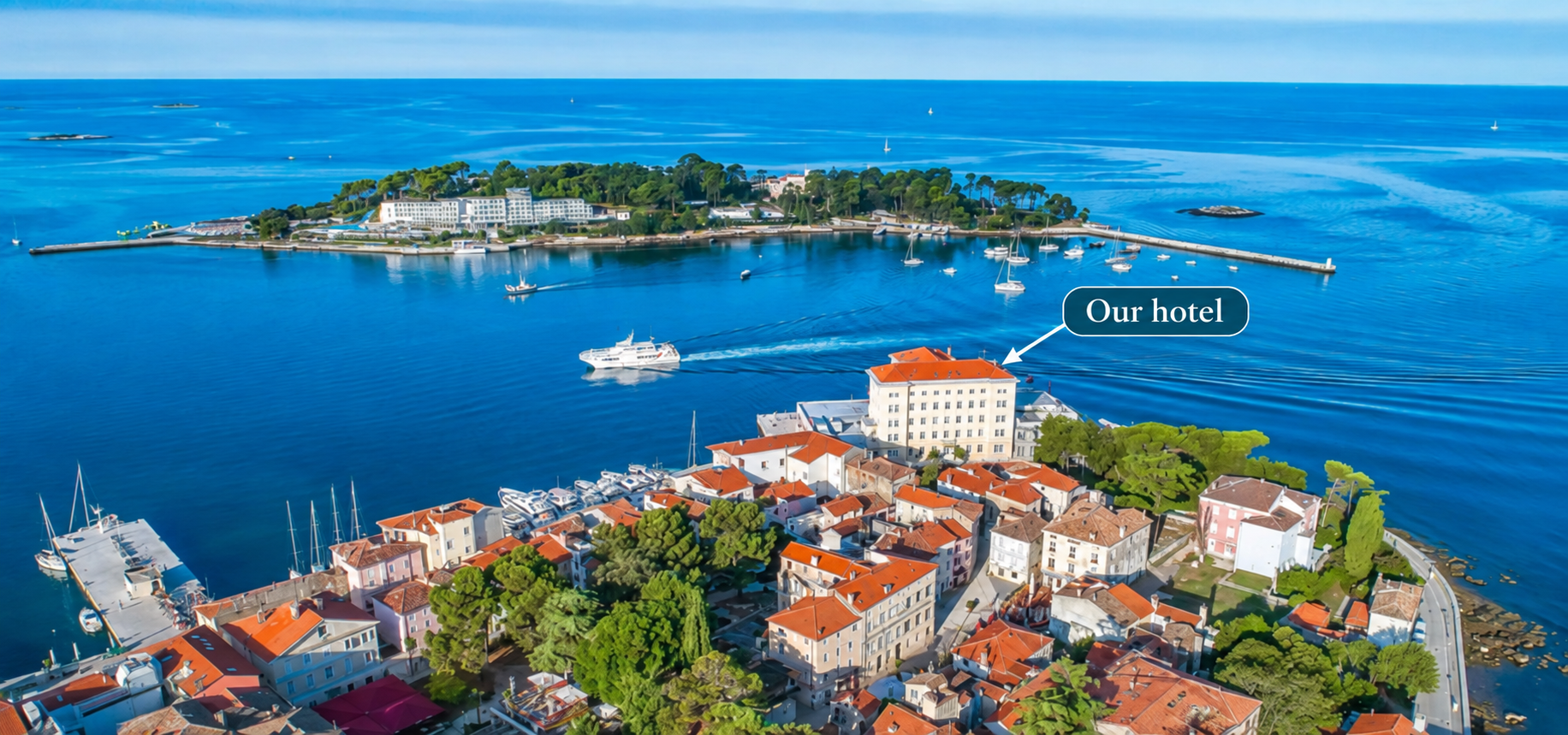Aerial view of Poreč showing our waterfront hotel